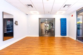 Dance studio with virtual fitness mirror
